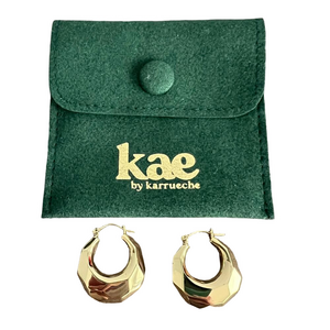 Kae by Karrueche signed gold tone chunky hoop earrings with branded pouch